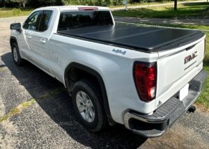 3. WHALEMOTOR Hard Folding Bed Cover