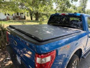5. MOSTPLUS Roll-Up Tonneau Cover